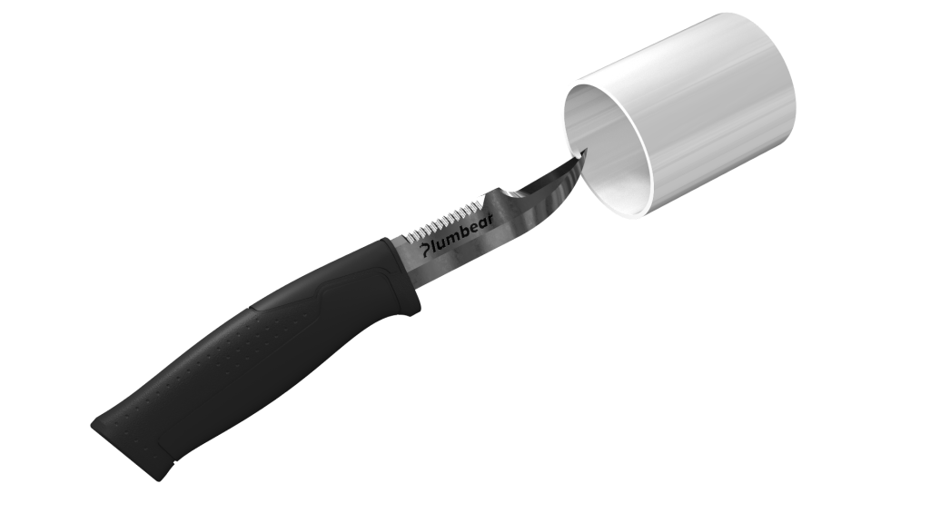 Plumbing knife cutting a plastic drain pipe